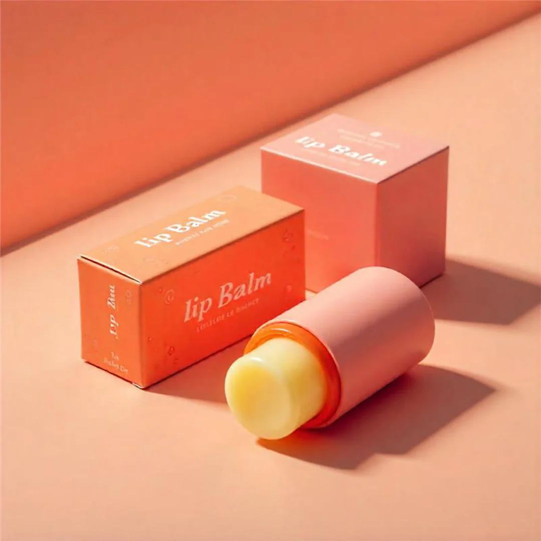 Lip balm box displayed against a pink background, showcasing its packaging design